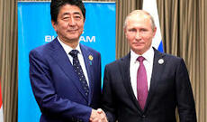 Sinzo Abe Putinlə telefonla danışmaq niyyətindədir