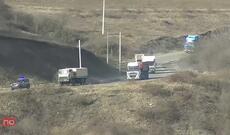 Rusiya sülhməramlılarının müşayiəti ilə Şuşaya tikinti materiallları çatdırılıb-Video