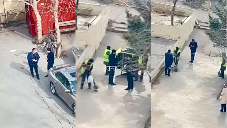 Bakıda tumu çırtlayıb yerə tökdülər, yaşlı qadınlara süpürtdülər - VİDEO