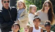 Colinin gəlin paltarı övladlarının şəkilləri ilə bəzədilib