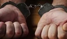 Həmyerlisinin qollarını baltalayan qandallandı