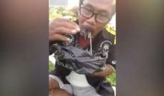 Mismarı çörək kimi yeyən adamın şok görüntüləri- VİDEO