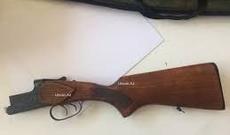 Bakıda qadının evindən tüfəng və patron tapıldı