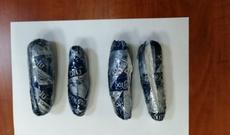 Dərman preparatlarını avtomobilin mühərrikində gizlətdi