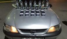 Avtomobildə gizlədilən spirtli içkilər və siqaretlər aşkarlandı