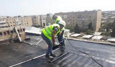 Bakıda binaların dam örtükləri təmir olunur