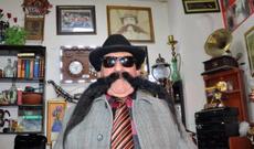 60 ildir bığını kəsmir